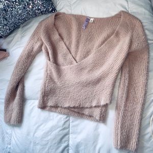 Fuzzy cross over sweater